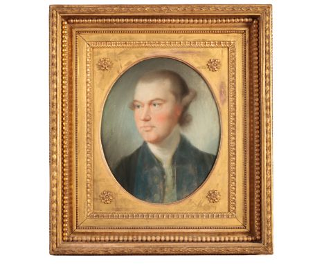 ENGLISH SCHOOL, 18th century A portrait of a gentleman wearing a blue coat and a white stock, oval, pastel, 30cm x 25cm, reta