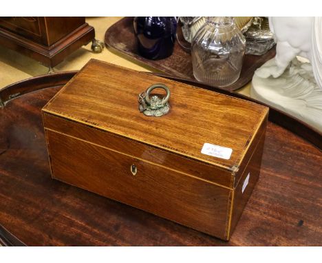 A 19th century large mahogany twin-handled oval galleried tray and a mahogany tea caddy