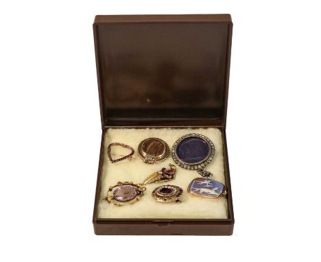 A garnet heart brooch, length 1.9cm; a split pearl hair work memorial pendant, length 3.3cm; a Georgian garnet and split pear