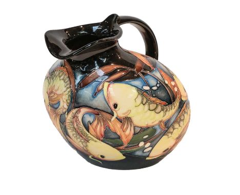 Modern Moorcroft pottery: a jug decorated in the Fishing Around pattern by Vicky Lovatt, 19cmCondition report: Good condition