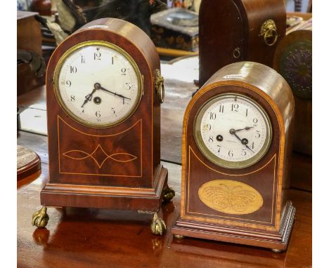 An Edwardian mahogany inlaid mantel timepiece with French movement, together with another mahogany inlaid striking mantle clo