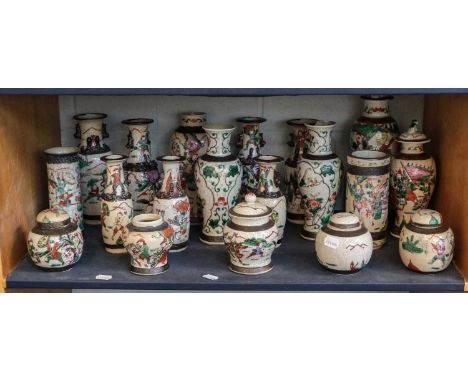 A collection of Chinese crackle glazed famille verte vases and ginger jars, of various shapes and size, depicting warriors (o