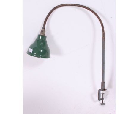 A vintage industrial machinists lamp with pendant shade finished in green with a Goose neck column terminating on a table edg
