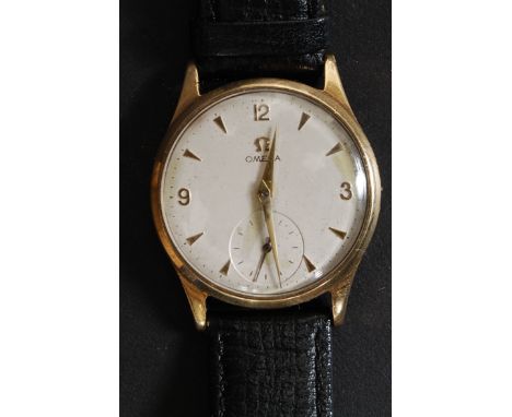 A 9ct gold gentlemans Omega wristwatch. The rear marked 375. Plain face with baton numeral chapter ring having subsiduary sec