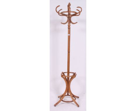 A light bentwood 20th century hat stand having shaped base with hooks atop H190 W69 cm
