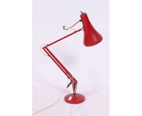 A vintage retro 20th century red Herbert Terry style anglepoise desk lamp with circular terraced base and pendant shade