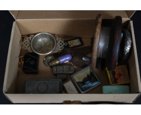 An interesting box of curios to include silver hallmarked thimbles, vintage fly fishing reel, cork screws, cuff links, compac