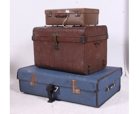 A vintage steamer trunk along with two vintage / retro suit cases H26 W91 D60 cm