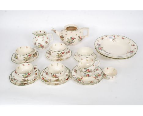 A Royal Doulton Old Leeds Spray part dinner / tea service with green stamps to verso  No D3548 Rd No 597783. To include cups,