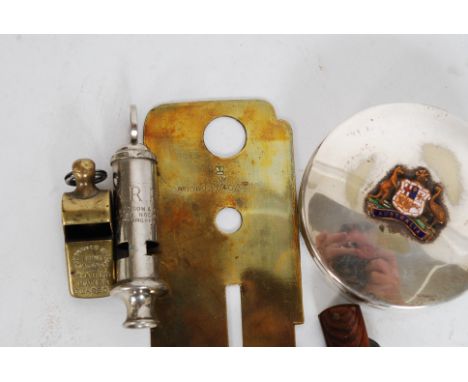 An Air Ministry brass mapping tool together with a S. Auld Scottish whistle, ARP Hudson whistle, military buttons and a white