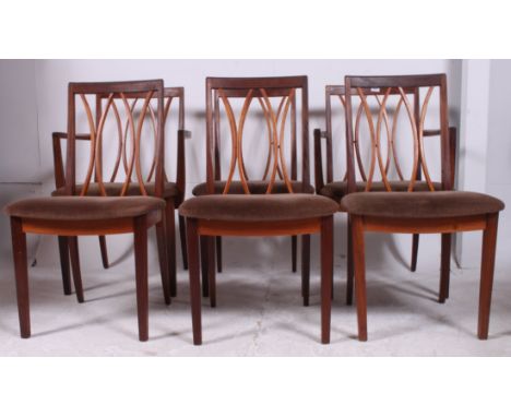 A set of 6 1970's retro vintage teak wood dining chairs by G-Plan. THe chairs with padded seats under elliptical shaped back 
