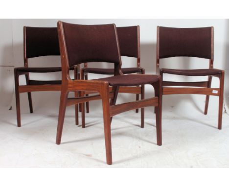 A set of 4 1970's retro vintage teak dining chairs having tapered supports with pad seats in the Danish style ( see illustrat