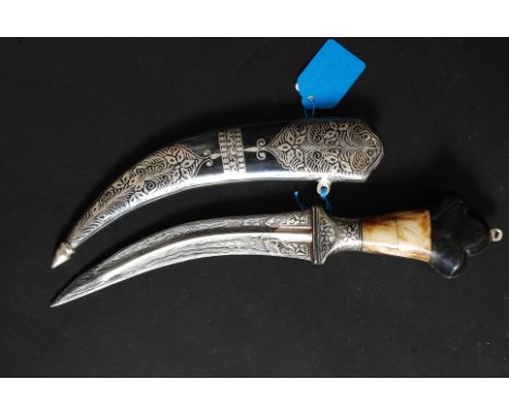 An unusual continental silver (unmarked) knife and scabbard