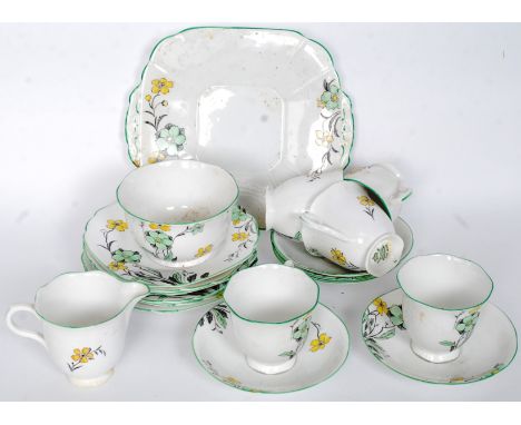 A 1930's Art Deco Melba handpainted bone china part tea service comprising cups, saucers, plates, sugar bowl creamer sandwich