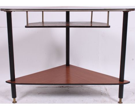 A vintage retro corner teak wood veneer  display stand with three shelves, brass detailing and ebonised legs H58 W75 D41cm