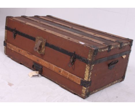 A vintage early 20th century wooden and canvas strap steamer trunk suitcase complete with the inner tray and lined interior H