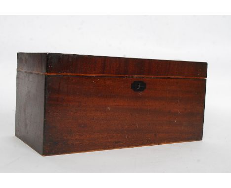 A Georgian mahogany and ebony strung inlaid tea caddy box of rectangular form with hinged top and  with appointed interior se