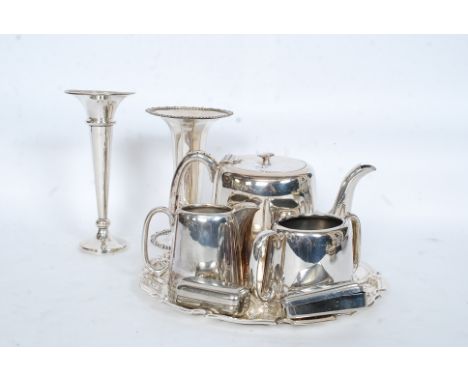 A good quality silver plate tea service comprising matching teapot, sugar and creamer together with un-associated salver, sol