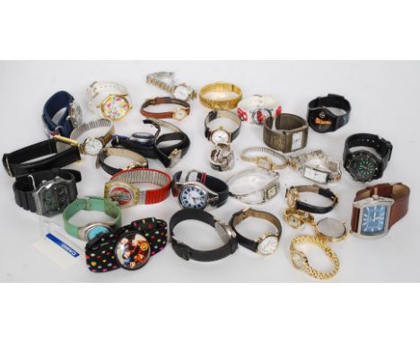 A collection of watches to include cocktail watches, gentlemans watches, digital watches, timex and others etc