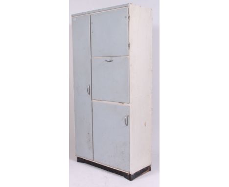 A vintage mid century painted kitchen cupboard having a tall larder section and three subsequent cupboards with appointed int