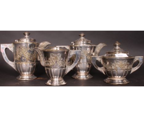 A 20th century silver plate tea service comprising coffee pot, teapot, sugar bowl and creamer. Marked M in star to the base