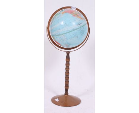 A vintage / retro floos standing Political Globe raised on a turned bobbin stand H80 W30 cm