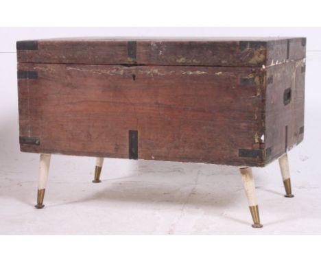 A 19th century steamer trunk with ebonised hinged brackets with hinged top H47 W69 D46cm