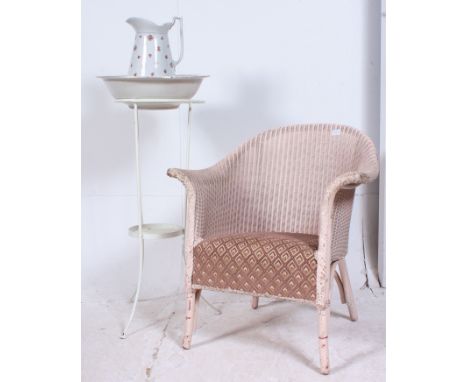 A fabulous cast metal bedroom washstand complete with ceramic jug and bowl together with a Lloyd Loom style bedroom chair