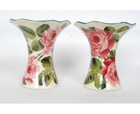 A fabulous pair of ceramic Wemyss pottery flared vase with hand painted rose decoration being stamped to the base ( see illus