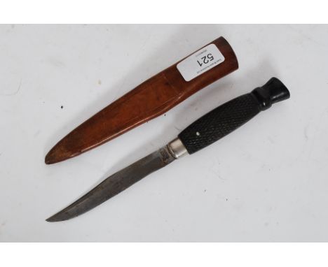 A Sheffield 20th century Sas hunting knife complete with the leather scabbard