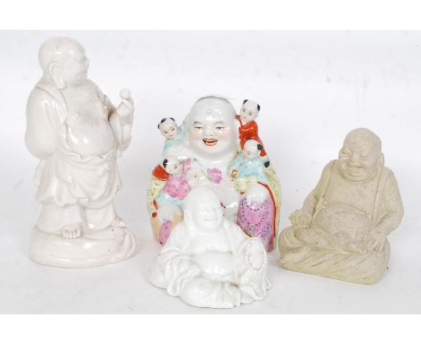 A collection of 4x vintage ceramic Buddha figurines. 