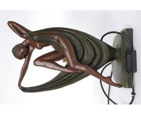 An art deco style lamp off a sitting lady in an undressed manor H38cm