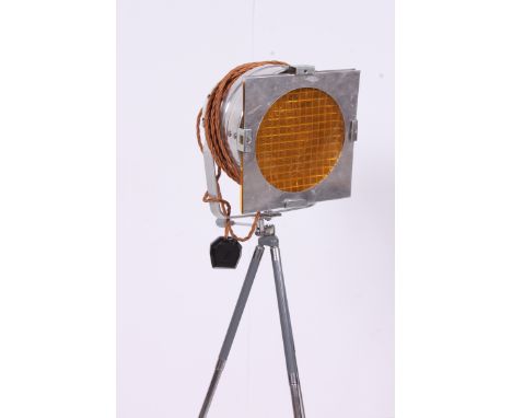 A fabulous 20th century Industrial  chrome theatre light in the manner of Parcan 64 raised over a telescopic chrome tripod st