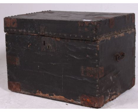 A Victorian ebonised and studded steamer trunk chest with hinged centre having detailed stud work to the edges H37 W51 D38 cm