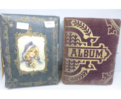 Two albums of Victorian carte de visite studio family portrait photographs, held in bound albums (one album part full). Studi