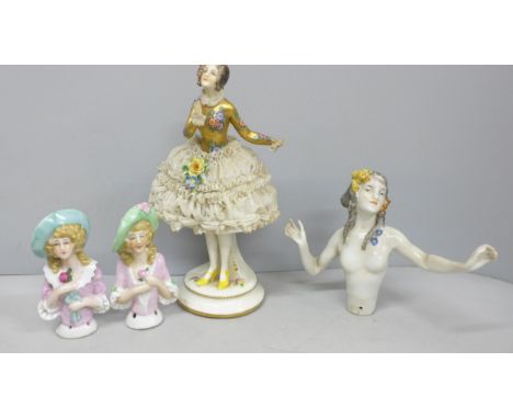 A collection of porcelain figures to include a German half doll, a pair of half dolls and another figurine possibly Dresden w