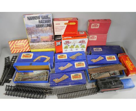 A collection of model rail including Tri-ang, Hornby Dublo and Jouef. Models and tracks.