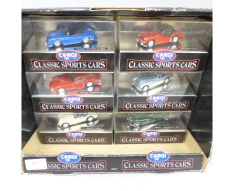 Six Corgi Classic Sports Cars model vehicles, each boxed and in a shop display