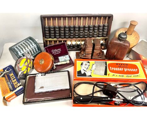 A collection of assorted items including penknives, Milbro Thumbgrip catapult, an abacus, lighters, Echo Luxe M. Hohner harmo