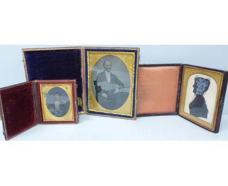 Two Victorian daguerreotype photographs and a silhouette portrait 