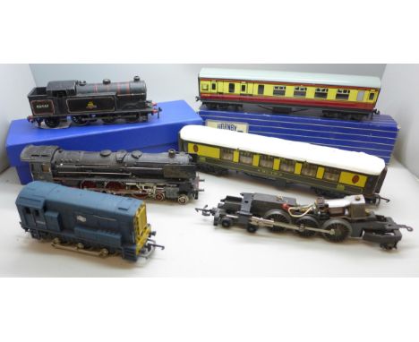A collection of model railway, three locomotives, Hornby, Marklin and Lima, and two carriages