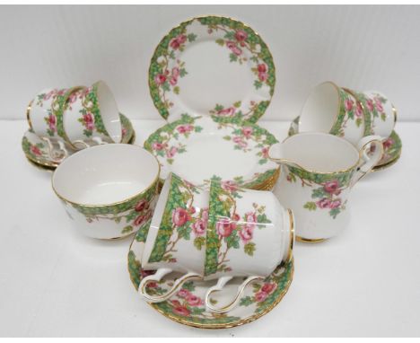 A Royal Stafford bone china tea service "Olde English Garden" pattern comprising of six cups and saucers, milk jug and sugar 