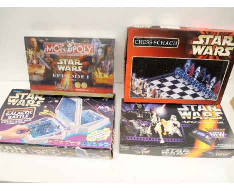 A selection of Star Wars games, including Episode I original Star Wars chess set, Star Wars Monopoly, Star Wars puzzle, and m