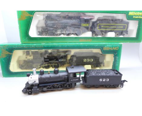 Three HO gauge model railway locomotives; two Mehano Train Line, Santa Fe and Pennsylvania, and one Model Power AT &amp; SF, 