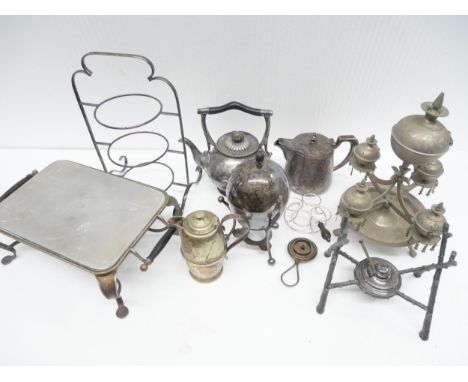 A collection of silver plated items to include teapot on stand, an egg coddler, warming tray, jug and other teapot and a pewt