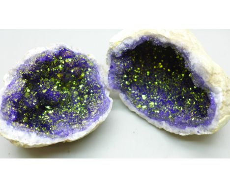A Moroccan rainbow titanium coated quartz geode, approximately 7.5cm x 9cm
