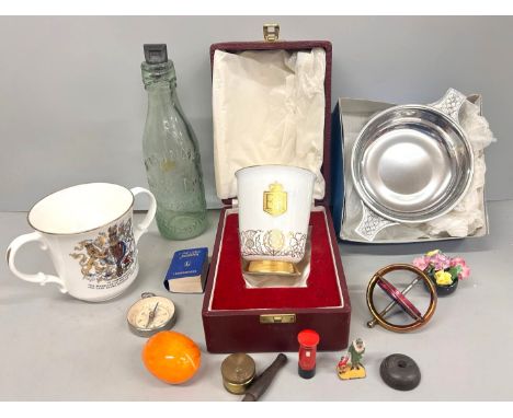 A pewter quaich, A Royal Doulton commemorative mug, a Minton commemorative goblet and a glass bottle