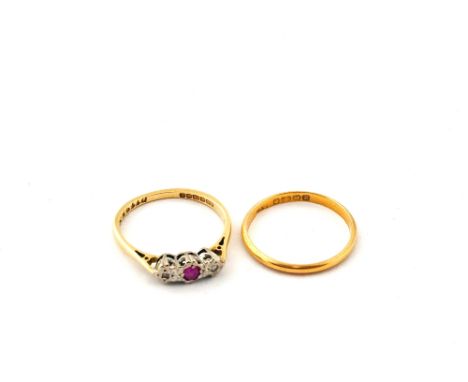 A 22ct Gold wedding band and 18ct Gold and pink stone ring, both size K