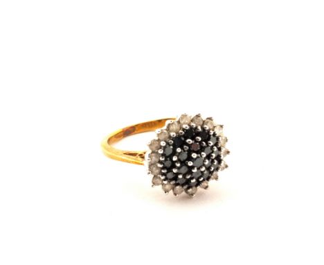 A 9ct Gold Diamond and Sapphire cluster ring, size L