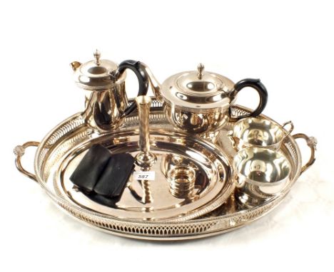 An oval Silver plated gallery tea tray, four piece tea set and other items including a Silver serviette ring